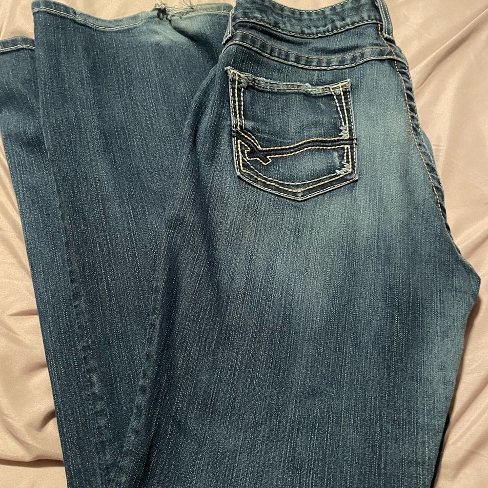 Bke Kate size 33x331/2 jeans. Worn on hem but a lot of wear left.